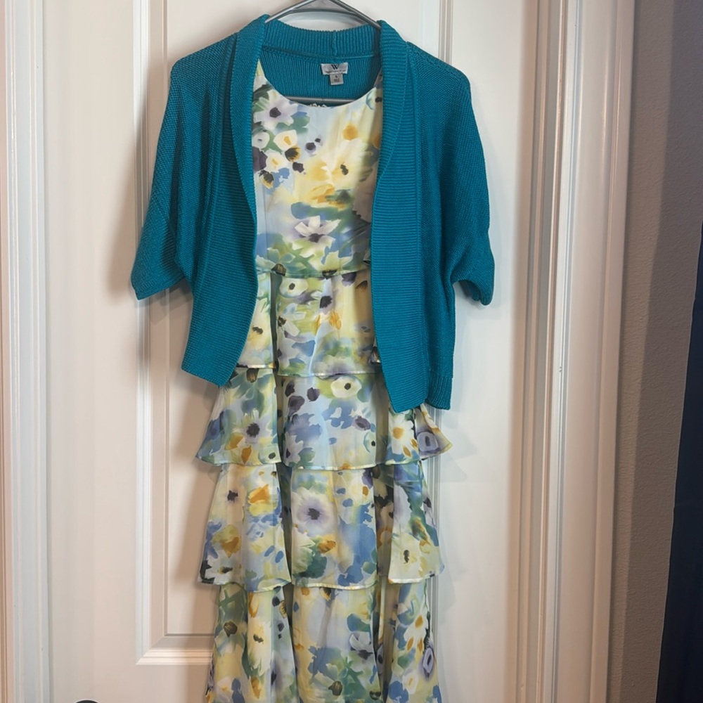Women’s sleeveless dress with jacket